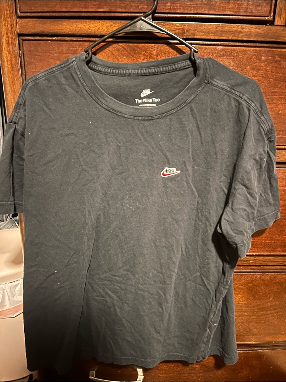 Nike Women’s Black Short Sleeve Tee with Small Red Swoosh
